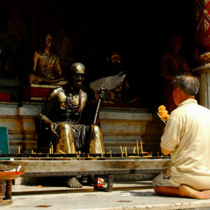 Praying at a buddhist temple